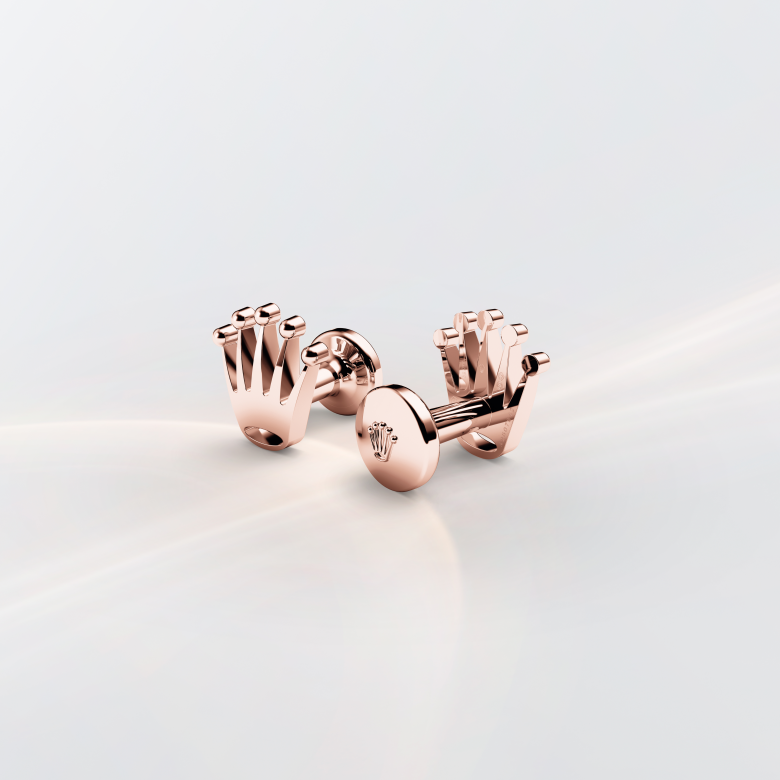 Rolex cufflinks made of 18 ct Everose gold and shaped in the form of the signature Rolex crown.