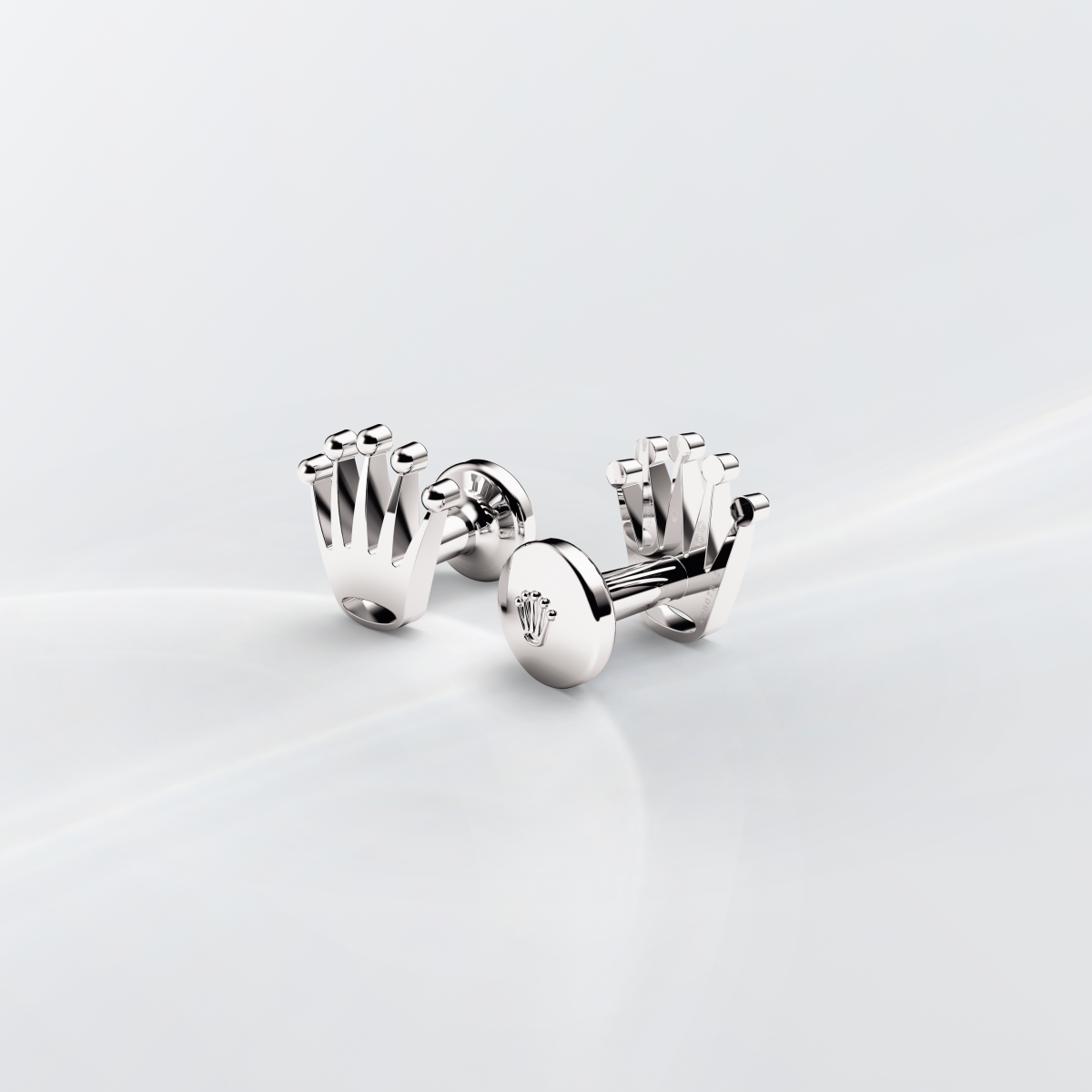 Rolex cufflinks made of 18 ct white gold and shaped in the form of the signature Rolex crown.