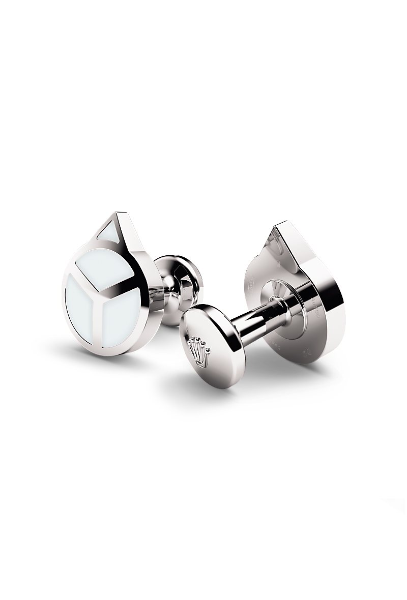 Rolex cufflinks made of 18 ct white gold that echo the hour hand found on Professional Rolex watches, equipped with a Chromalight display.
