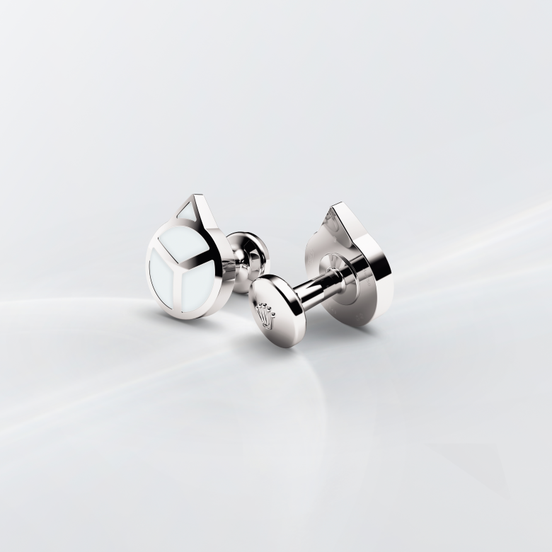Rolex cufflinks made of 18 ct white gold that echo the hour hand found on Professional Rolex watches, equipped with a Chromalight display.