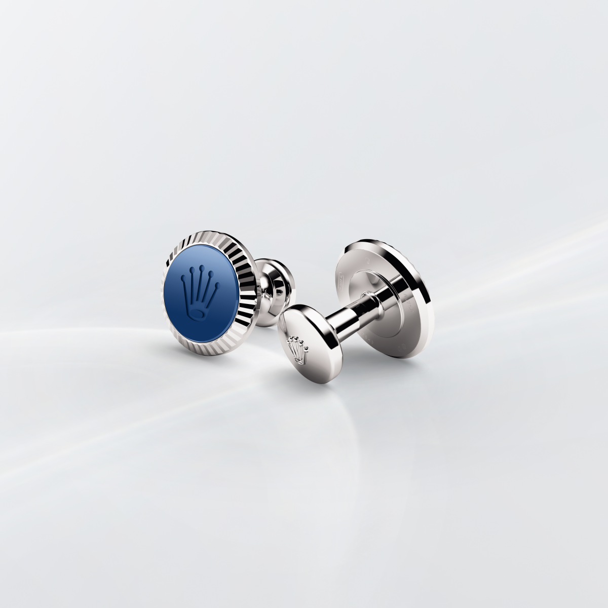 Rolex cufflinks made of 18 ct white gold featuring the signature Rolex fluting, Cerachrom insert and Rolex crown.